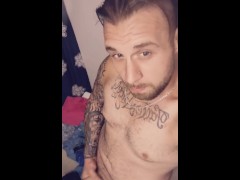 Sexy tatted dude busting a nut 