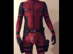 in DEADPOOL costume with NO UNDERWEAR ON and that BIG PACKAGE