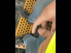 Peeing on a trailer at work