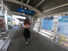 Crossdresser flashing in a train station
