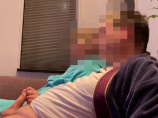 Casual handjob from wife while watching tv on couch