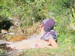 Shameless Muslim slut topless in hijab Smoking in nature 