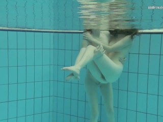 Nastya undresses Libuse in the pool like_a lesbian