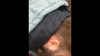 Outside In The Woods A Cub Is Sucking On A Chaser