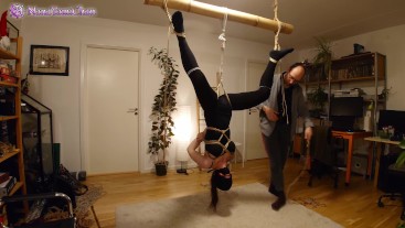 Shibari play session with suspension in butterfly harness and spanking