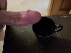 Filling a cup with cum part 2