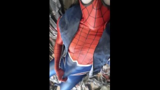 Spiderman rubs one out, cums in his suit 