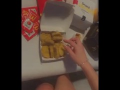 teen eating MCDONALD’S nuggets with cum