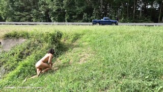 Crawling completely naked in public next to the road