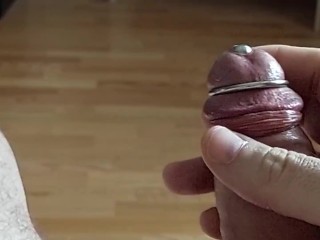 Cumshot through penis_urethral plug with glans ring (slow motion cumshot)