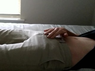Rubbingmyself through my pants, then pulling out my_hard cock!