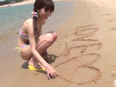 Skinny Japanese chick enjoys having a photoshoot on the beach