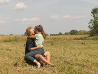 Beautiful TeenCouple inLove Passionately Kissing on the field