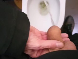 In A Public Place, My Femboy Slut Holds My Dick And I Piss In A Dirty Urinal
