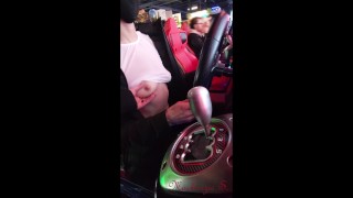 Voyeur At An Arcade A Woman Flashes Next To Two Strangers