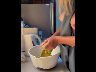 Cooking topless with big tits