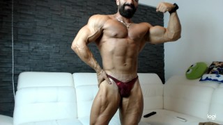 Bodybuilder Granit Ripped Muscles Flexing Forcefully