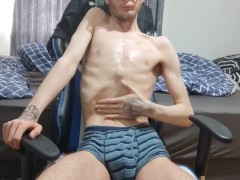 Extremely skinny teen oils up his body and shows his features