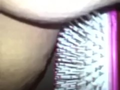 Pounding pussy with hairbrush 