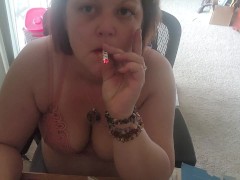 Sexy brunette smoking 420