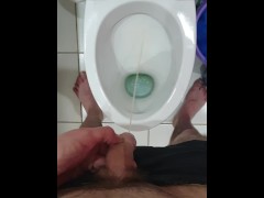 Pissing in toilet 