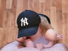 Athletic girl in a cap prefers to do a blowjob