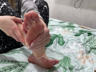 A schoolgirl can oil her feet. Foot fetish