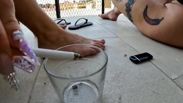 Lady Muffin and I smoking a cigarette naked on the balcony. FETISH