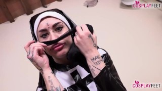 Horny tattoed Italian nun Denise takes off her pantyhose after getting horny, all the time talking t
