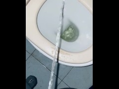 pissing in a dirty bathroom