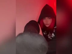 Goth girl shows her foot in knee high socks