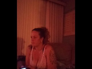 Milf With Cleavage Showing Playing Video Games