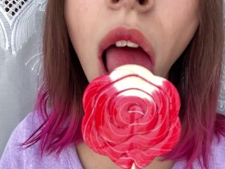 Naughty stepsister sucks a lollipop_and show her long hot sexy_tongue