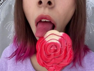 Naughty stepsister sucks a lollipop and_show her long hot sexy tongue