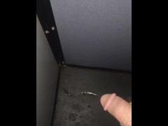 Pissing in adult book store booth