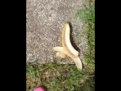 Girl crushing banana