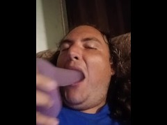 Sean teasing with a purple dildo