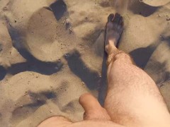 Naked on public beach