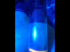 pumping dick and balls under blue light