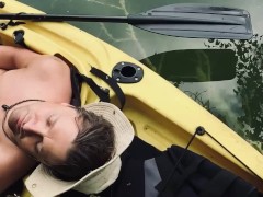 Smooth white daddy jerks his uncut cock in his kayak. 