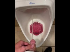 Pissing in public restroom 