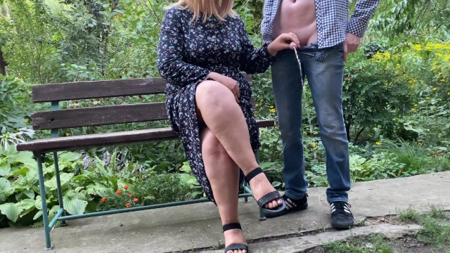 She Holds His Cock While He Pee In The Park 3480