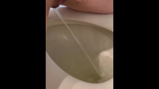 Naughty Wifey Standing And Pissing Into The Toilet
