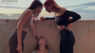 Outside On A Public Balcony Mistresses Agma And Sofi Spit On A Slave-Girl Lezdom Spitting