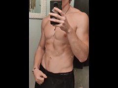 fit twink showing off in the mirror