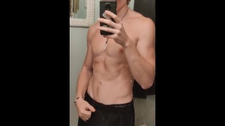 fit twink showing off in the mirror