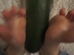 simulating footjob with an huge zucchini by a virgin cute girl