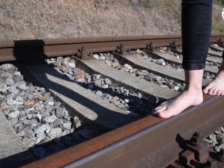 Barefoot walking and dirty feet on rails (long toes, bare feet, foot tease, sexy feet, public feet)