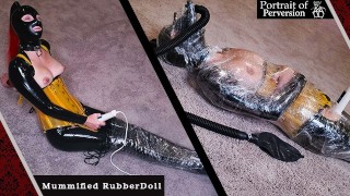 RubberDoll se momifica y se corre: Chica de látex envuelta en plástico se corre en una varita mágica
