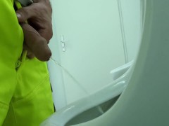 construction worker pissing at work